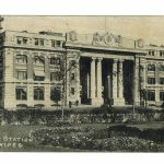 A black and white withered photo of 181 Higgins pillar doors, from the 19th century,