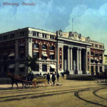 a colored photo of 181 Higgins, with a visible streetcar on the road, along with horse wagons. From the 19th century.